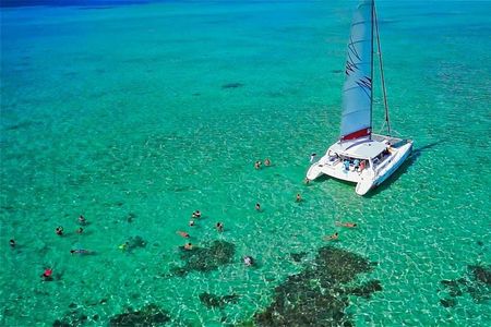 Catamaran to Ile aux Cerf with Parasailing, Tube Riding & Lunch