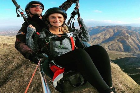 Paragliding free flight experience over the pre-range