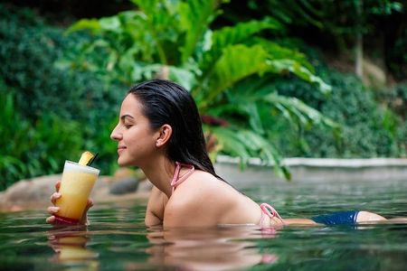 Epic Thrill & Tranquil Escape: Zipline, Waterslide & Hot Springs