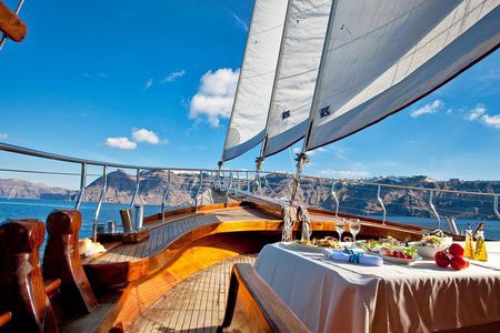 Santorini Caldera Sunset Sailing Cruise with Dinner and Wine