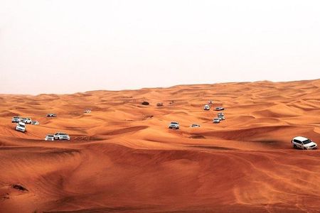 Dubai Desert Safari Red Dune: BBQ, Camel Ride & Sandboarding