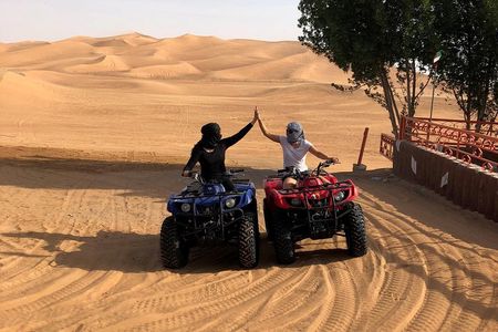 Dubai: Unique SUNSET Quad Bike Red Dunes Safari 