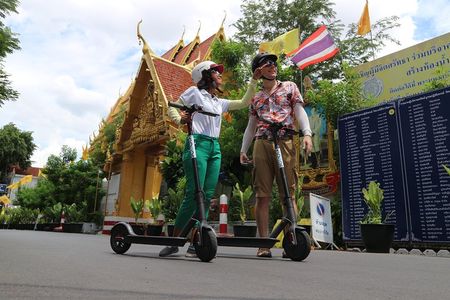 Explore Bangkok by E-Scooter & Try Street Food