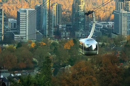 Aerial Tram Ride with Doughnuts at Sunrise in Portland Oregon