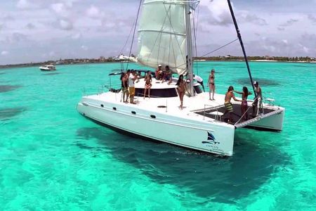 Catamaran adventure to Isla Mujeres with Snorkel,Buffet,Open Bar and Beach Club