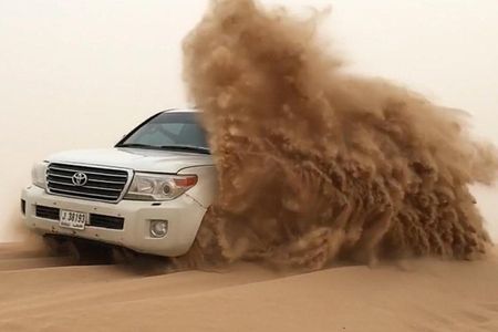 Desert Tour with Sand Boarding & Camel Riding