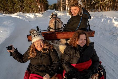 Sleigh or wagon ride in the arctic Country side 