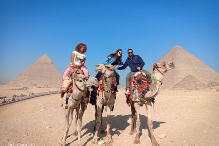 Explore Giza Pyramids & Sphinx with a camel trip