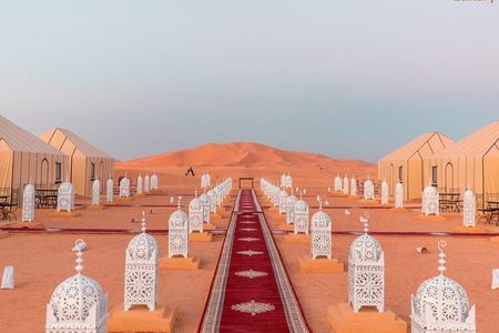  Overnight in Desert Camp with Camel Ride All meals &sandboarding