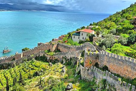 from city of Side: Alanya city tour with lunch and boat trip
