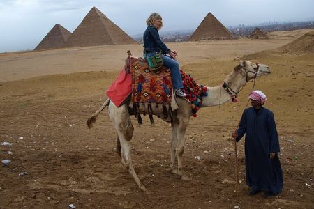 Half Day tour to Giza Pyramids with Camel ride and lunch