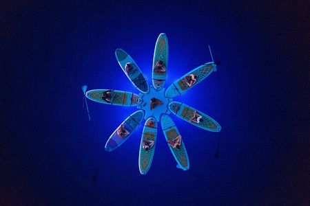 SUP YOGA Night Glow classes at Verudela beach, Pula