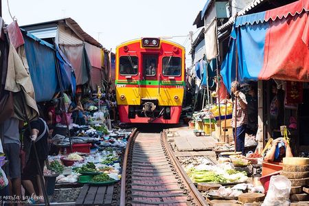 Damnoen Saduak Floating Market & Maeklong Train Market Tour
