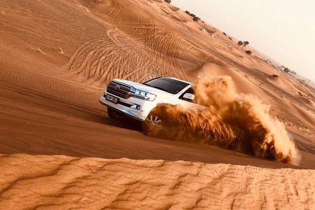Dubai Premium Desert Safari with BBQ Dinner and Camel Ride 