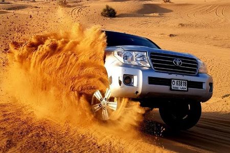 Evening Red Dunes Desert Safari: BBQ Dinner & Adventure Awaits!
