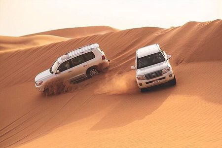 Red Dunes Dubai Desert Safari with Live show, Sandboarding & BBQ