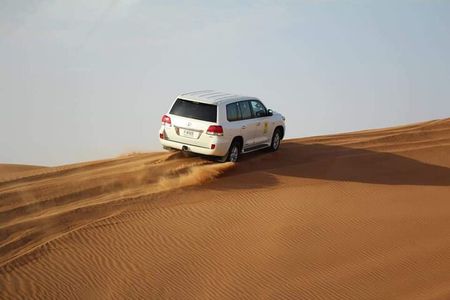 Desert Safari with Dune Bashing, Camel Ride & BBQ Dinner