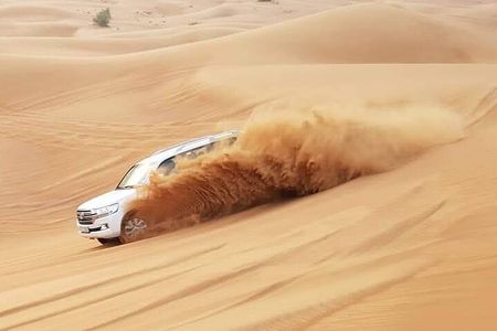 Dubai Desert Safari Tour Hotel Transfer, Camel Ride & BBQ Dinner