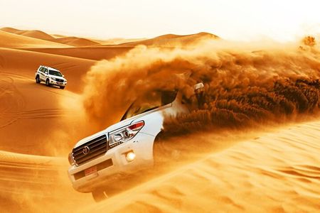 Dubai Desert Safari with Dune Bashing, Camel rides & BBQ Dinner