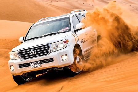 Dubai Desert Safari With Dune Bashing, Camel Ride & BBQ Dinner