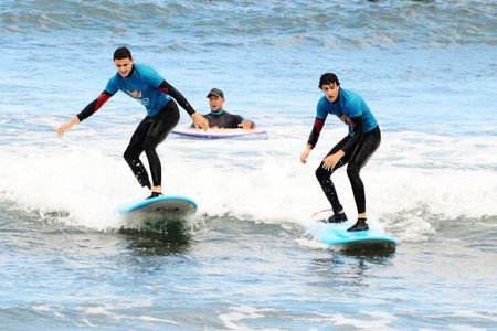 Group Surf Class in Playa de Las Américas with Photographs