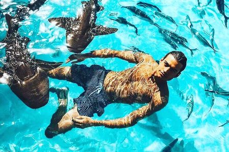 Small Group Tour- Flight, Lunch and Swimming with the Pigs Included