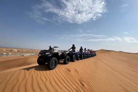 Guided Desert Quad Safari with Camelride, BBQ-Dinner and live-Shows