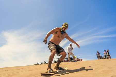Sandboarding at the Mogote Dunes
