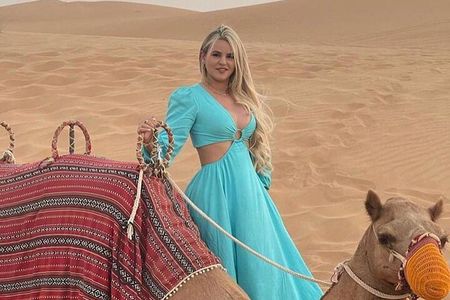 Private Evening Desert Safari: Sandboarding Camel Ride BBQ Dinner