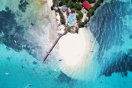 Prison Island; Stone Town Tour; Secret Garden; Kuza Cave; Paje Beach; The Rock