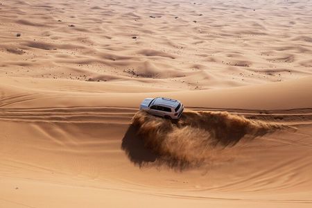 Morning Desert Safari Dubai:Red Dunes Desert,Camel Ride,Sand Boarding (Private)