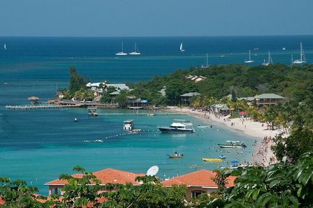 Catch a ride to West Bay & back to Port, Hotel, or Airport (Roundtrip Transfer)