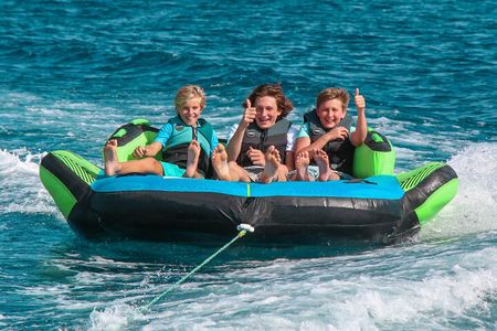 Private boat tour with fun tube