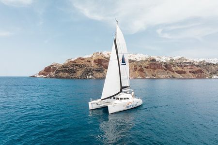 Private Morning Tour Lagoon 400-380 Sailing in Santorini ,lunch, drink, transfer