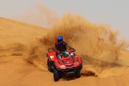 Dubai: Quad Bike Tour with Camel Ride, Sand Boarding & BBQ