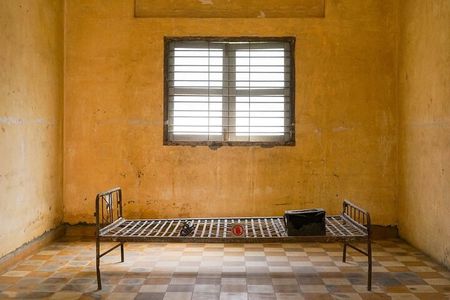 Tuol Sleng Museum and Russian Market Half-day Tour