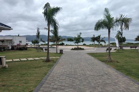 Harmony Beach & Park at Day and Luminous Blue Lagoon at Night