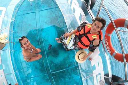 Transparent boat ride around Cozumel Island + Snorkel