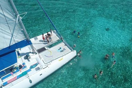 Full Day Catamaran Cruise on shared basis to Bénitiers Island 