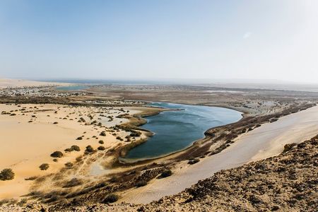 From Cairo: Desert Safari, Waterfalls, Sand boarding and Camel ride with Lunch