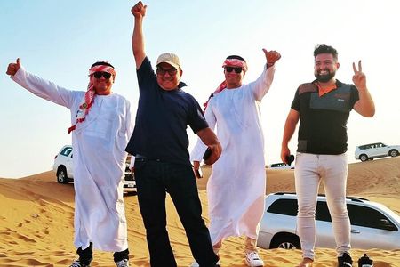 Morning Desert Safari with Sandboarding Camel Ride and Quad Bike