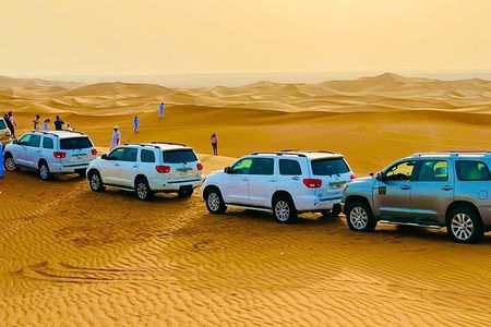 Afternoon Desert Safari with Quad Bike, Camel Ride and Sandboarding