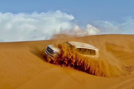 Dubai Desert Safari: Dune Bashing, Camel Ride, Sandsurf & 5* BBQ