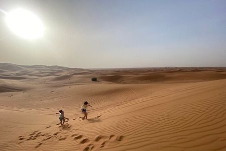 Morning Desert Safari with Dune Bashing, Camel Ride, Sand Board & Quad Biking