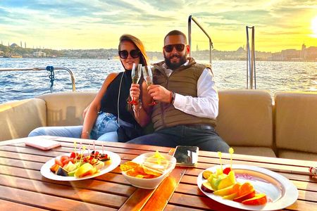 Bosphorus Sunset or Daytime Yacht Cruise with Snacks & Live Guide