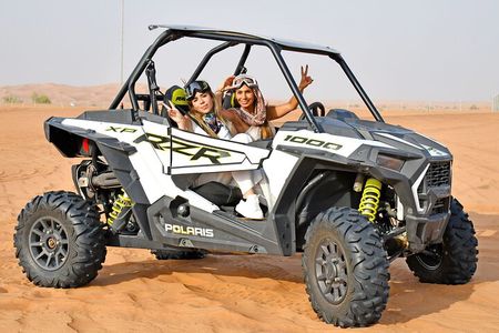 Premium Desert Safari Dune Buggy Camel Ride Sandboard & BBQDinner