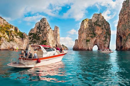 Capri Guided Boat Experience with Island Exploration and Transfer