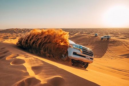 Morning Red Dunes Safari: Camel Ride & Sandboarding Adventure