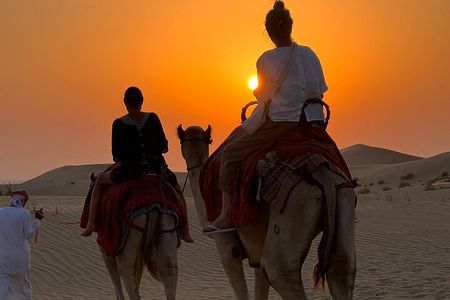 Desert Safari Abu Dhabi w/ Sand Boarding, Camel Ride & BBQ Dinner