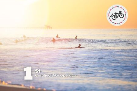 Surf lesson and Bike rental experience